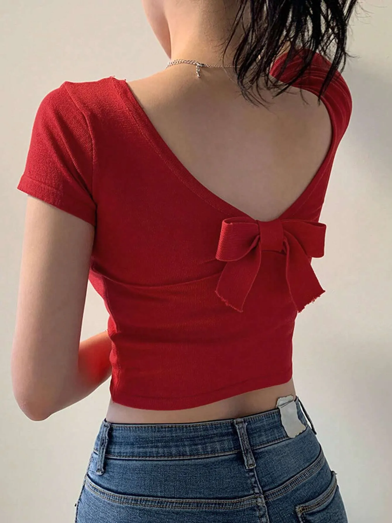 SHEIN DAZY Women's Solid Color Backless Bow Knit Crop Top