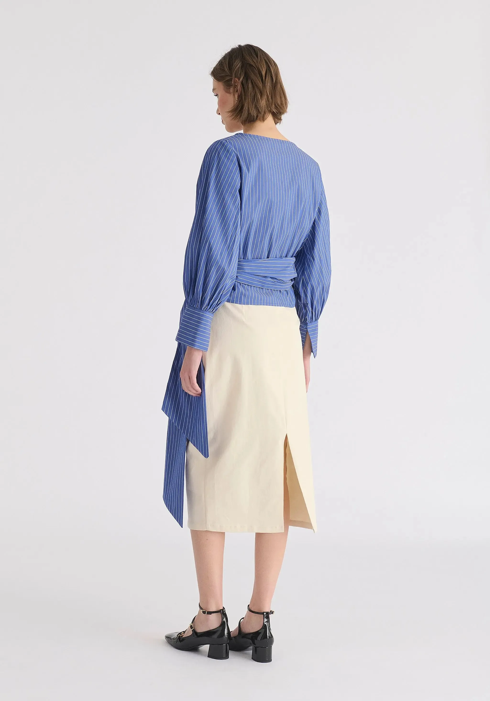 Tan Asymmetric Midi Skirt With Button Details
