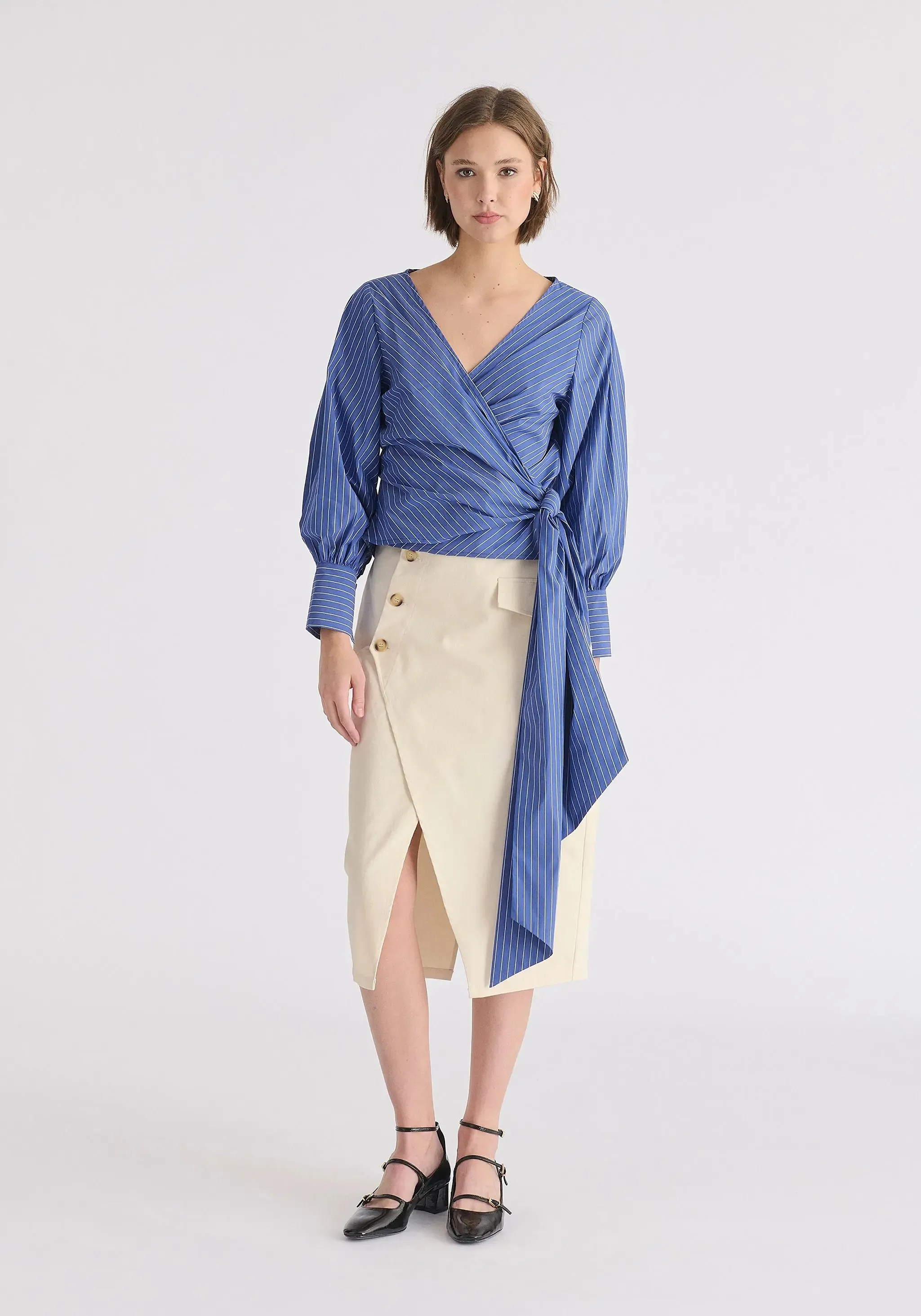 Tan Asymmetric Midi Skirt With Button Details