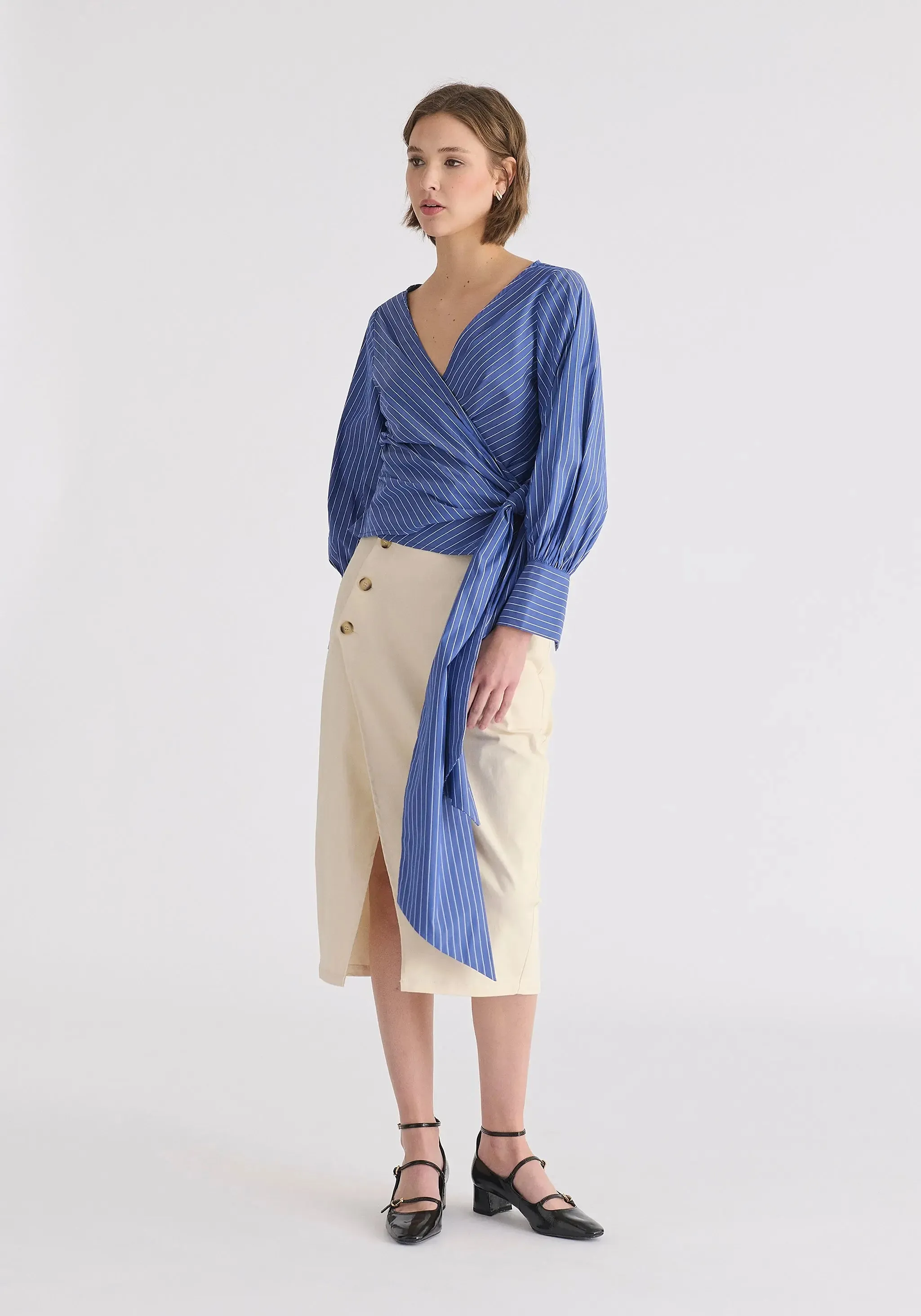 Tan Asymmetric Midi Skirt With Button Details