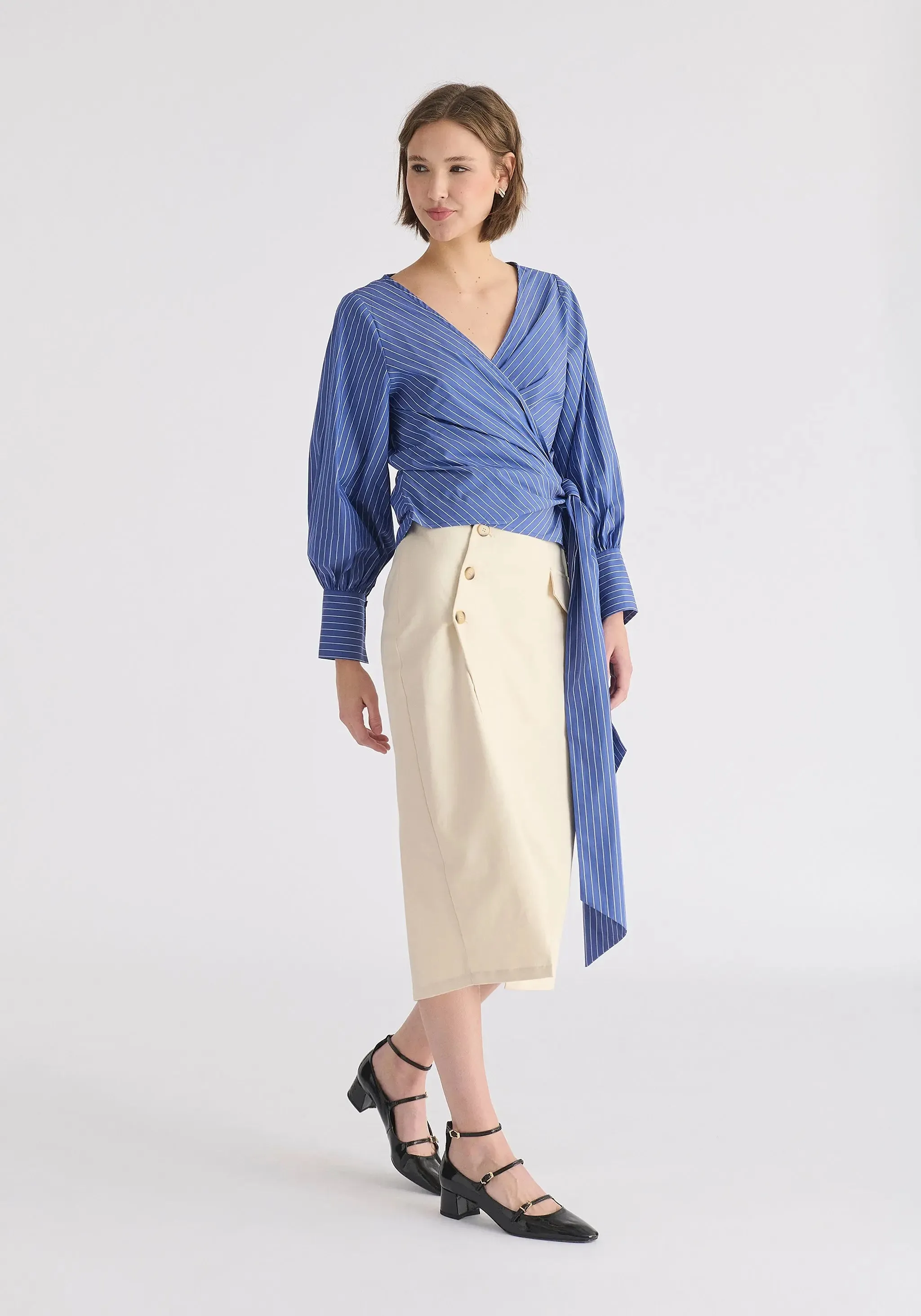Tan Asymmetric Midi Skirt With Button Details